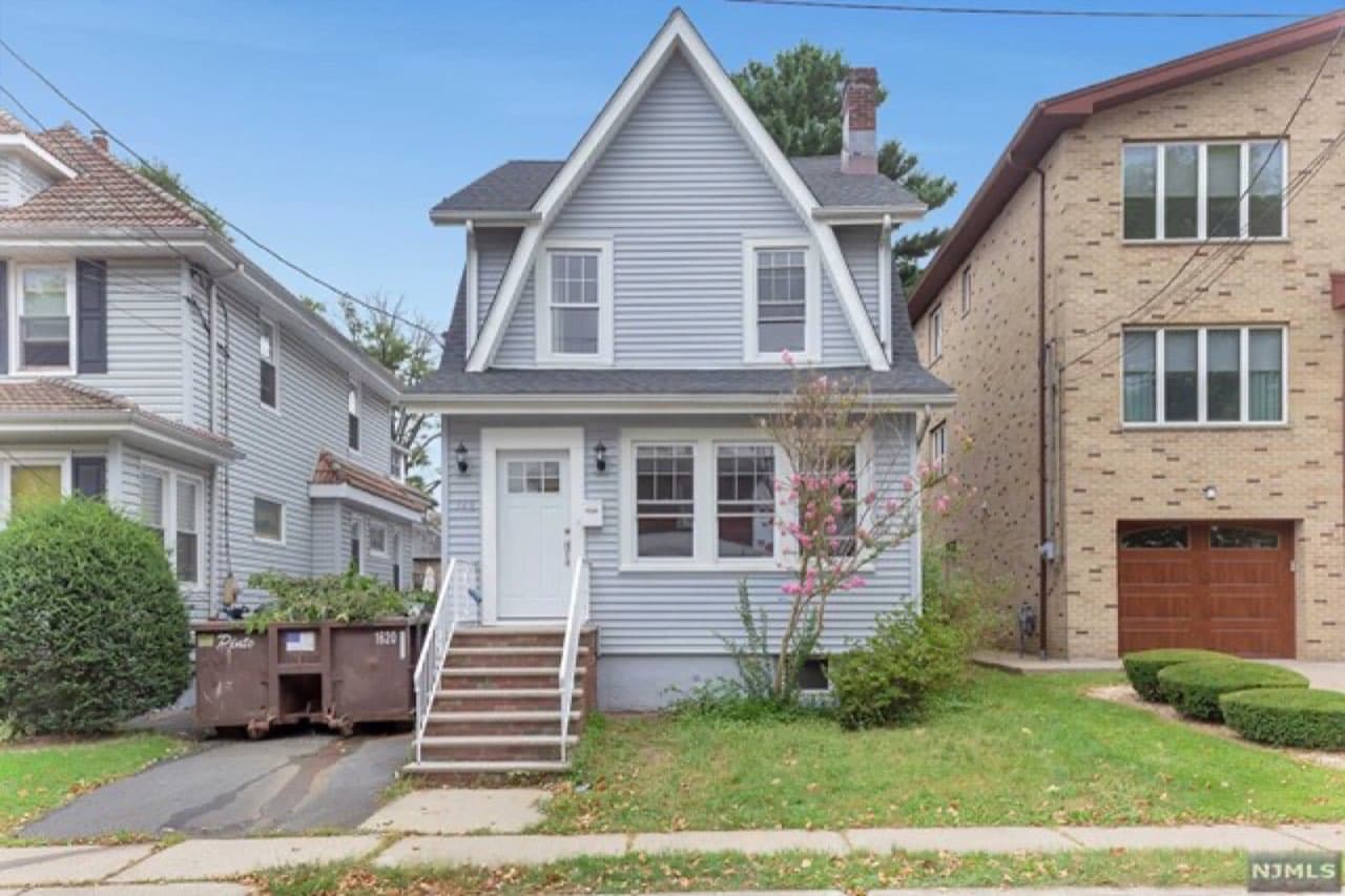 Home after renovation — refreshed exterior and landscaping