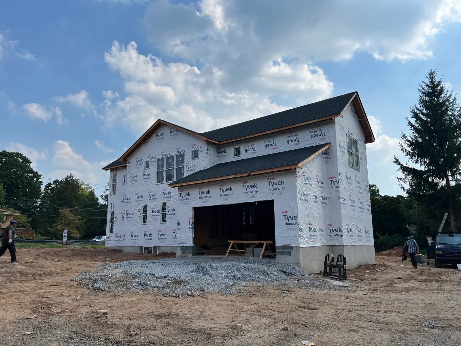 New build wrapped in house wrap during construction on Werimus Road