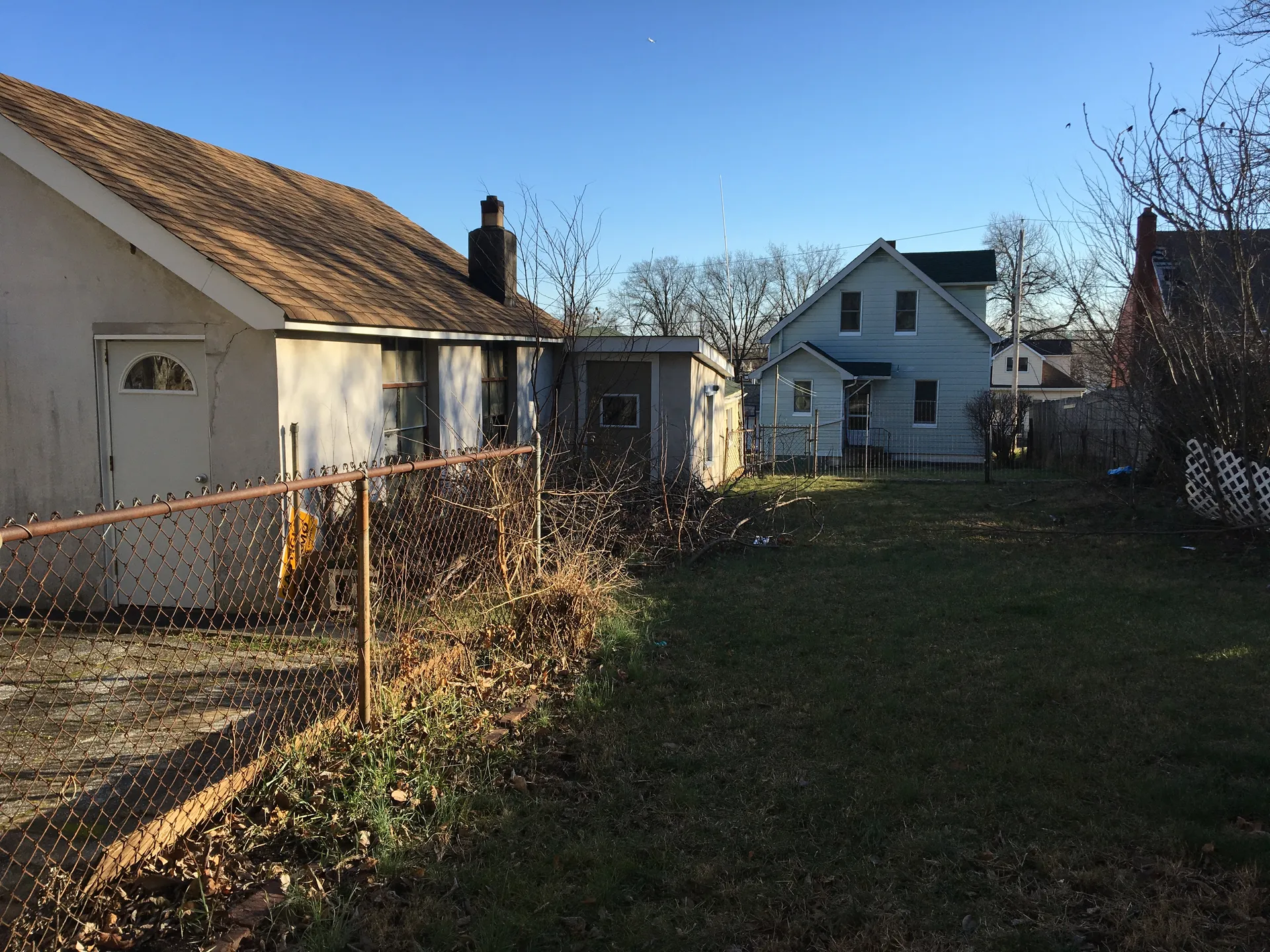 Original detached garage and backyard before renovation