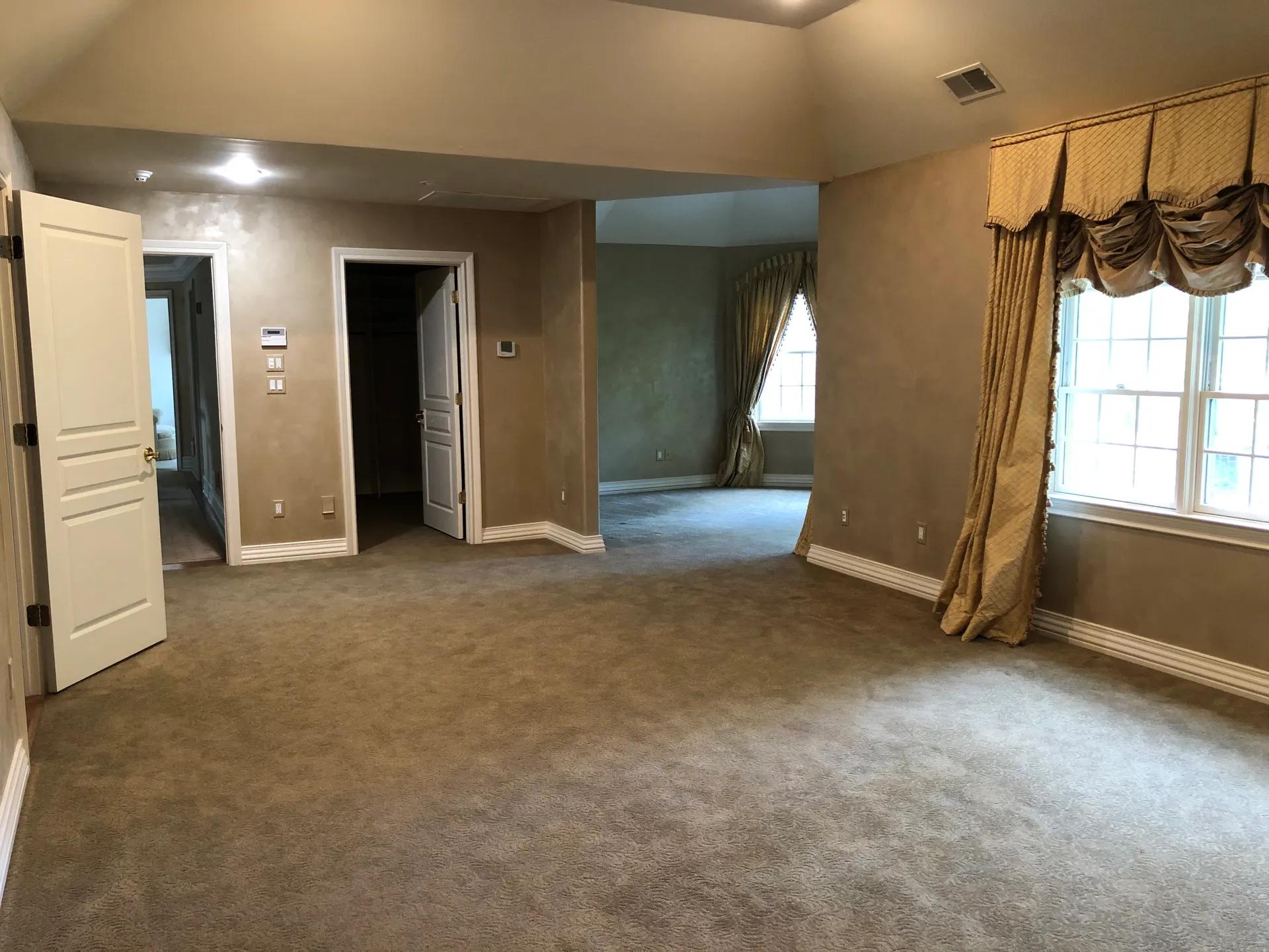 Primary bedroom suite before renovation
