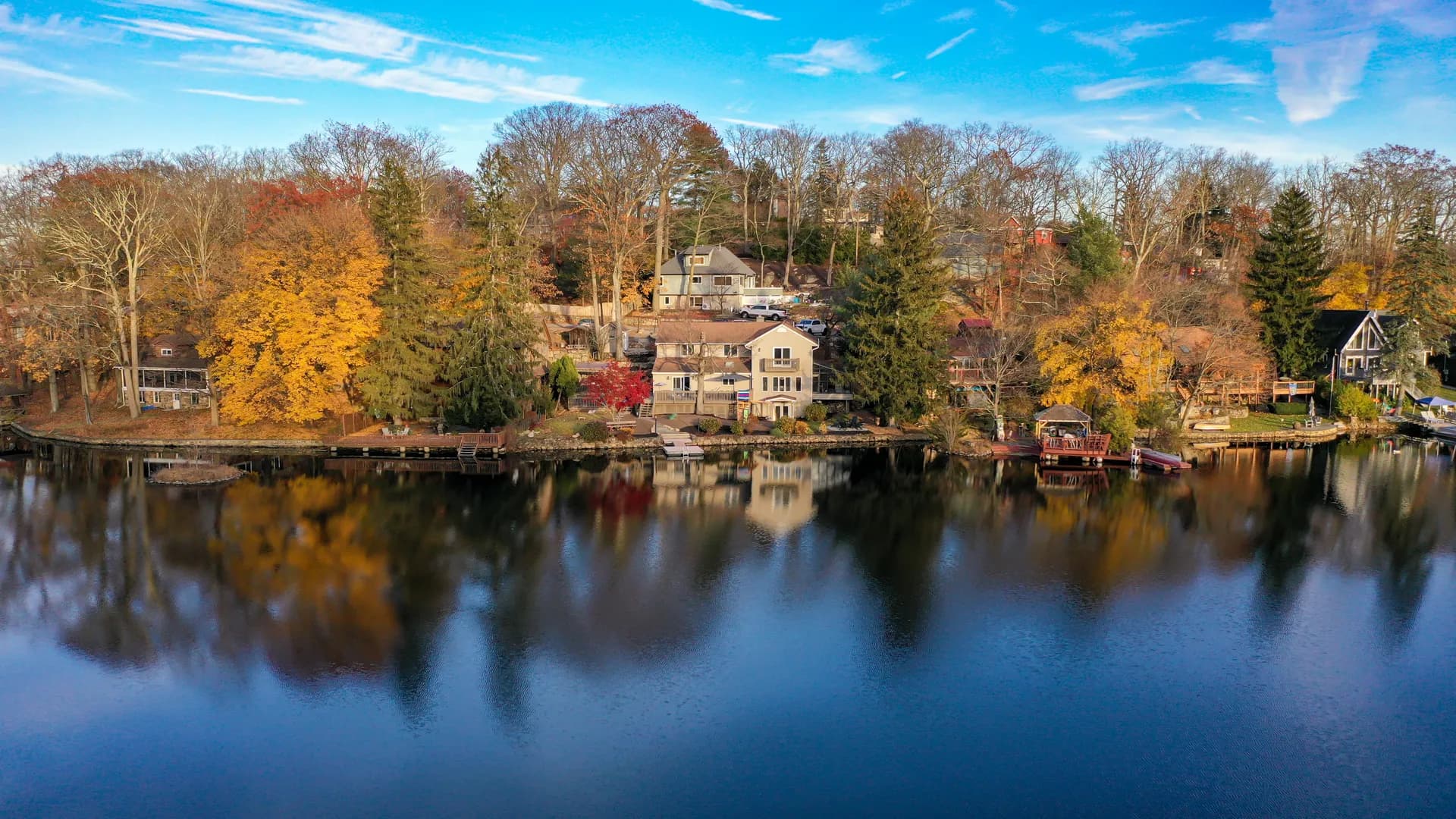 Aerial view of the renovated lakefront Airbnb property