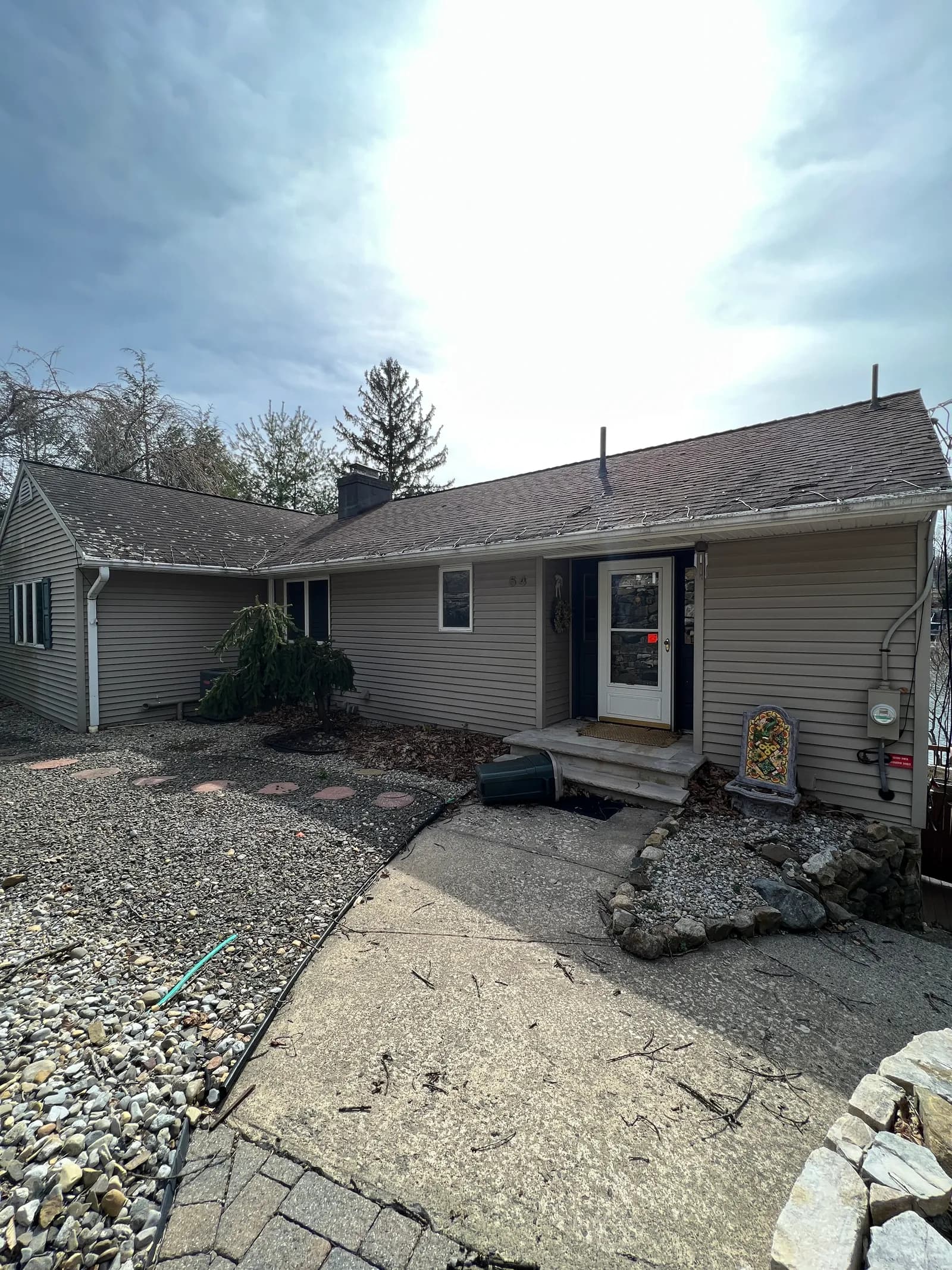 Dated lakefront home before renovation
